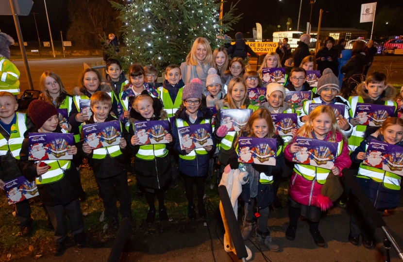 Esther with pupils from Lostock Gralam Primary School- and their selection boxes!