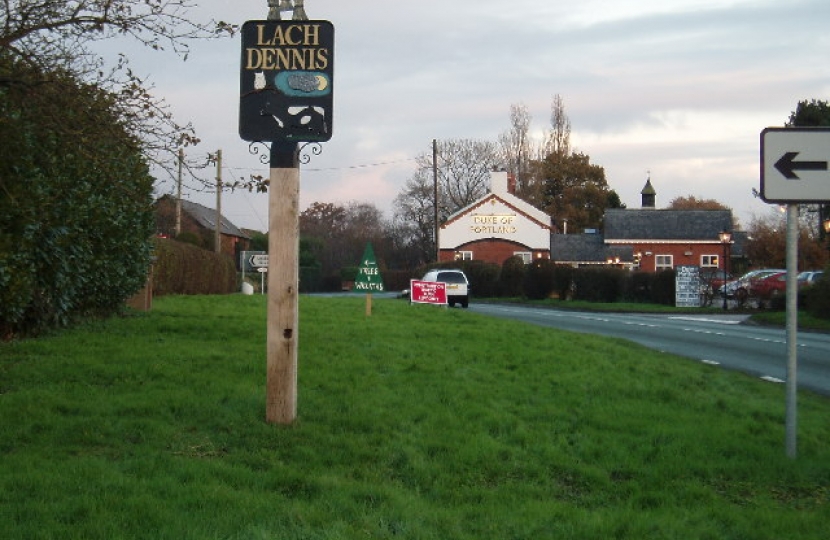 Lach Dennis village sign